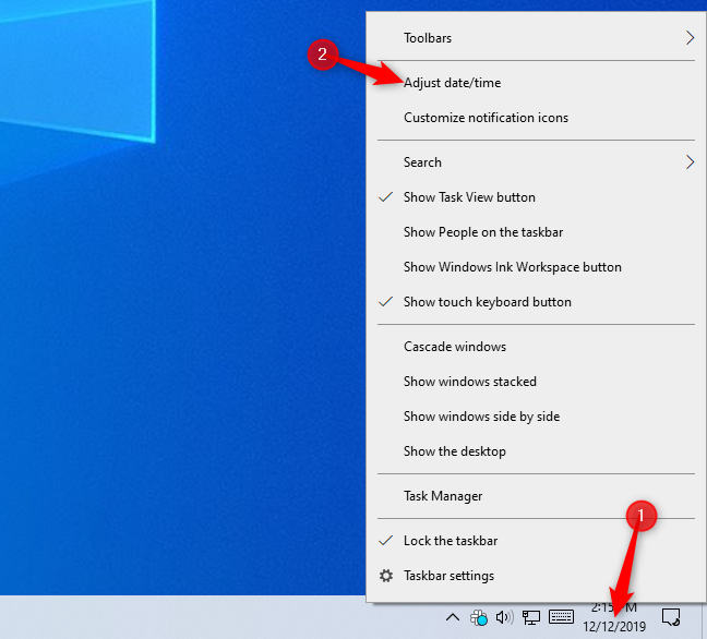 Membuka pengaturan waktu dari taskbar Windows 10.