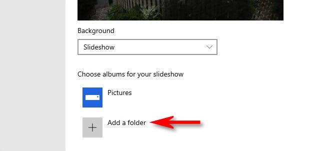 Setelah memilih "Slideshow", Anda dapat menambahkan folder gambar untuk digunakan sebagai slideshow layar kunci.