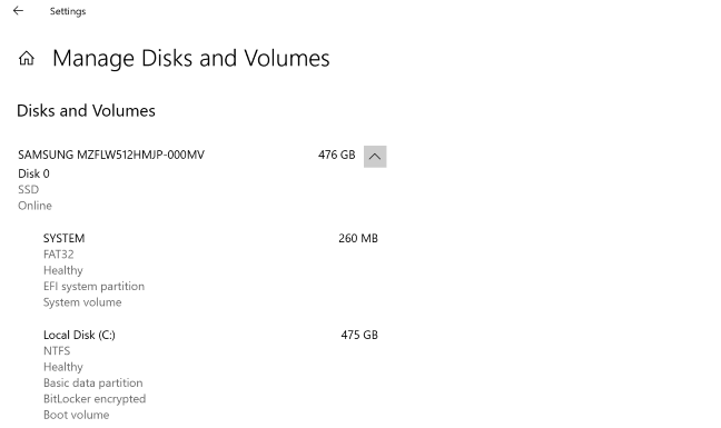 Layar "Kelola Disk dan Volume" di aplikasi Pengaturan Windows 10.
