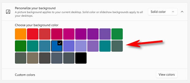 Dengan opsi "Warna Padat", klik warna di kisi.