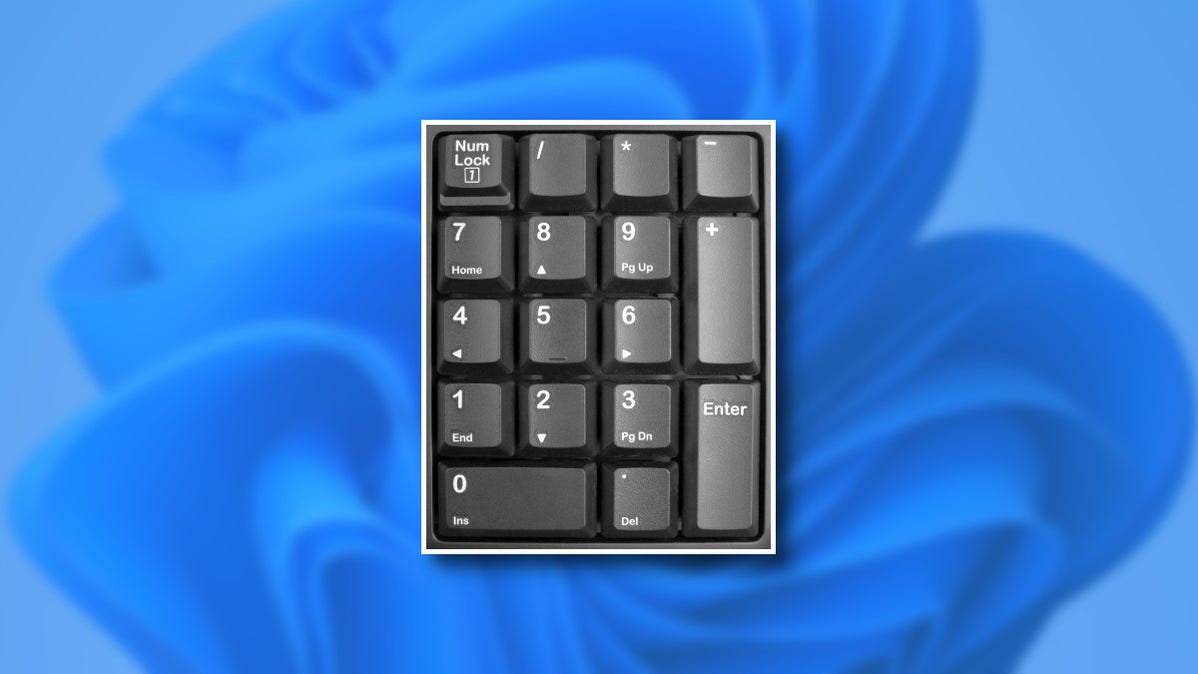 Keypad numerik di salah satu latar belakang desktop Microsoft Windows 11.